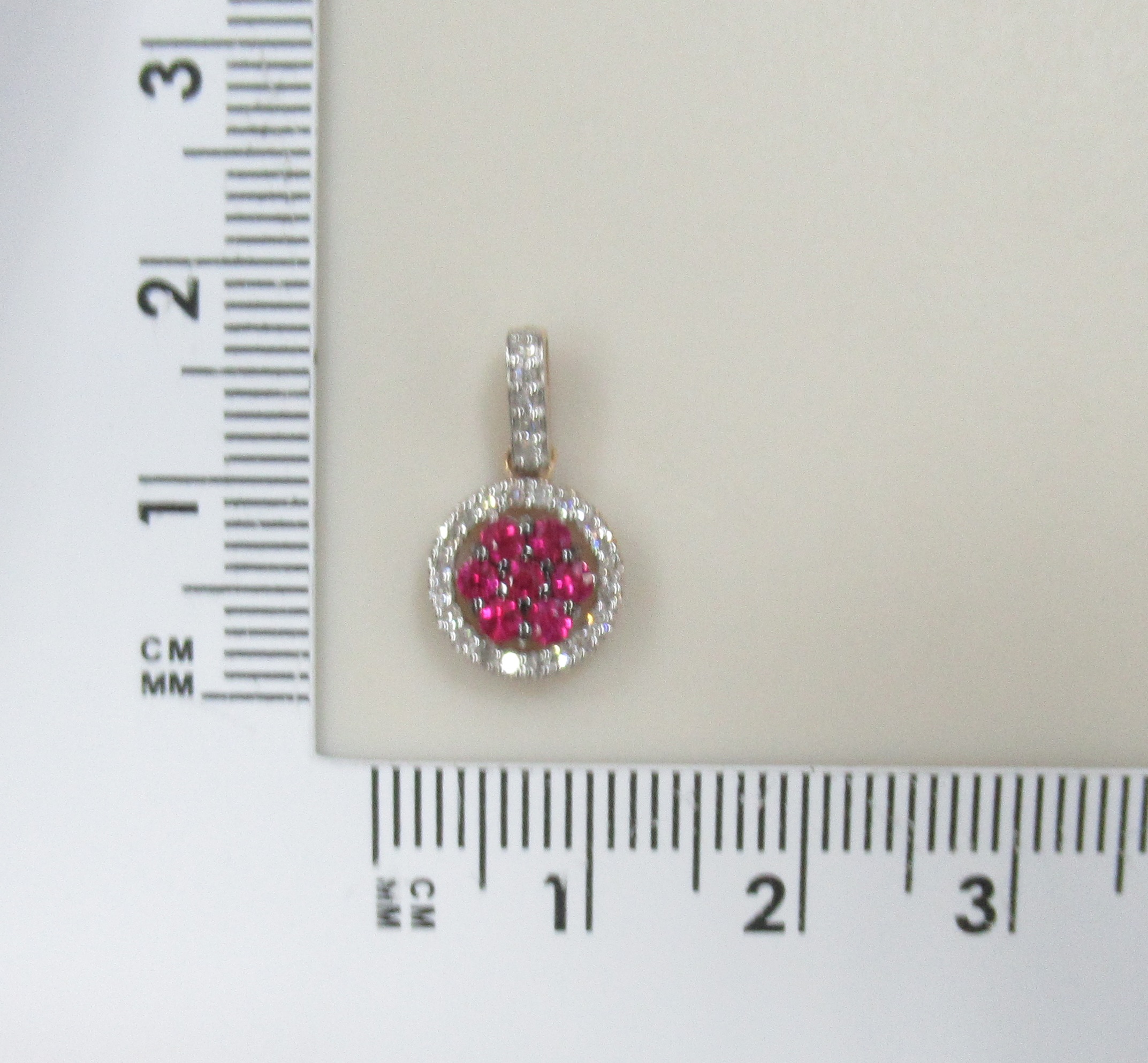 Подвеска из золота с рубинами